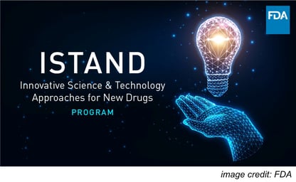 A glowing lightbulb hovers over an open hand. FDA logo in the corner. Text reads ISTAND: Innovative Science and Technology Approaches for New Drugs Program.